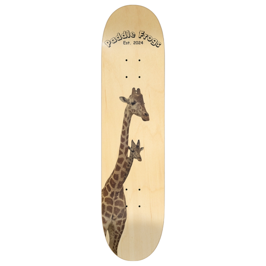 Skateboard deck with mom and baby giraffe design and 'Paddle Frogs' branding on 7 layer maple wood transparent background