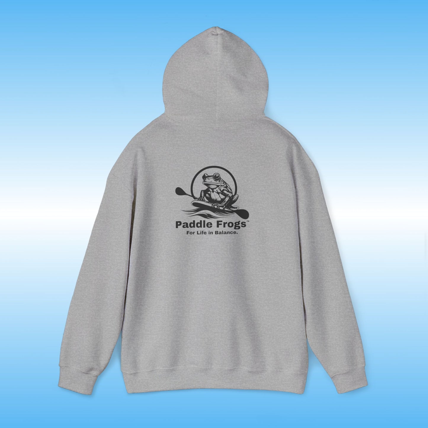 Gray hoodie with 'Paddle Frogs' logo on a blue gradient background Heather Gray Original frog on a paddle board with a double bladed paddle For Life in Balance.