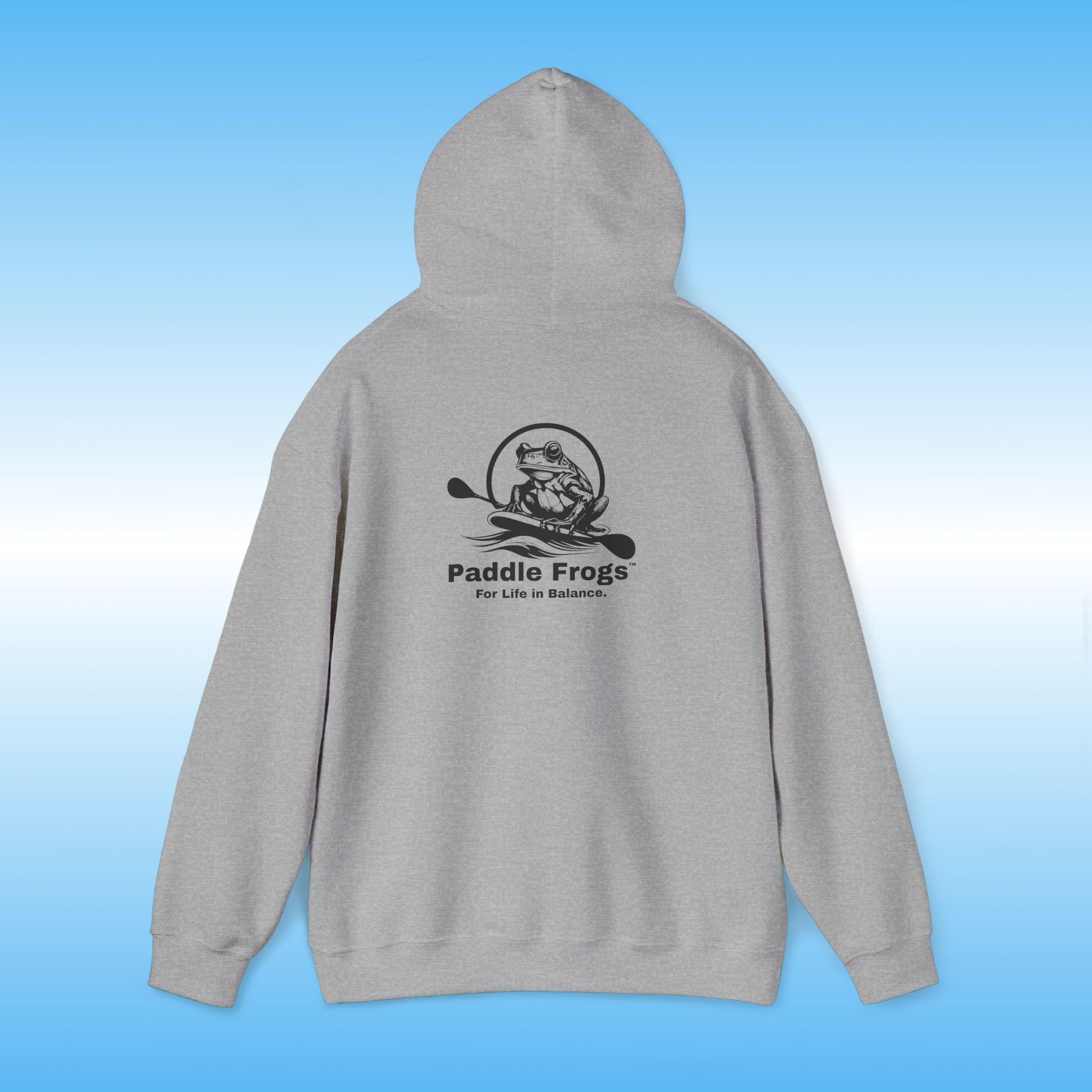 Gray hoodie with 'Paddle Frogs' logo on a blue gradient background Heather Gray Original frog on a paddle board with a double bladed paddle For Life in Balance.