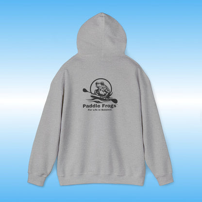 Gray hoodie with 'Paddle Frogs' logo on a blue gradient background Heather Gray Original frog on a paddle board with a double bladed paddle For Life in Balance.