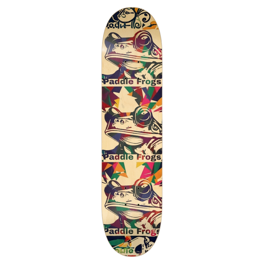 Kaleidoscope 7 3/4"Skateboard deck with colorful frog design and 'Paddle Frogs' branding on a transparent background