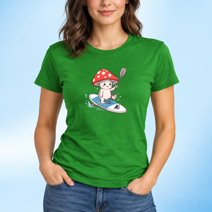 Ladies green t-shirt Shiro’s Paddle Day Women’s Tee | Paddle Frogs™ with Shiro the Magic Mushroom Forest protector paddleboarding on Paddle Frogs paddleboard.