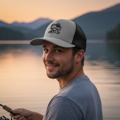 Male model wearing Paddle Frogs™ Snapback Cap heather grey and black vented mesh at the lake