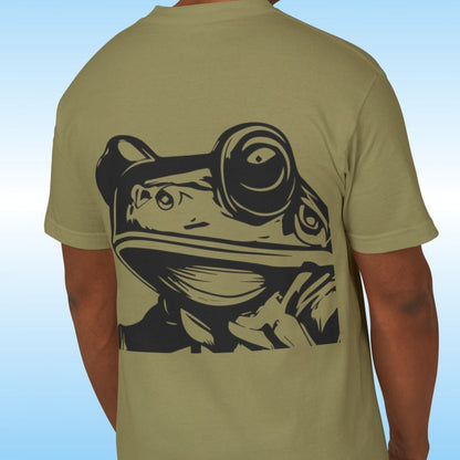 Man wearing a green t-shirt with a black graphic Frog Face design on the back against a blue gradient background | Part of the paddle Frogs Earthy Tee collection