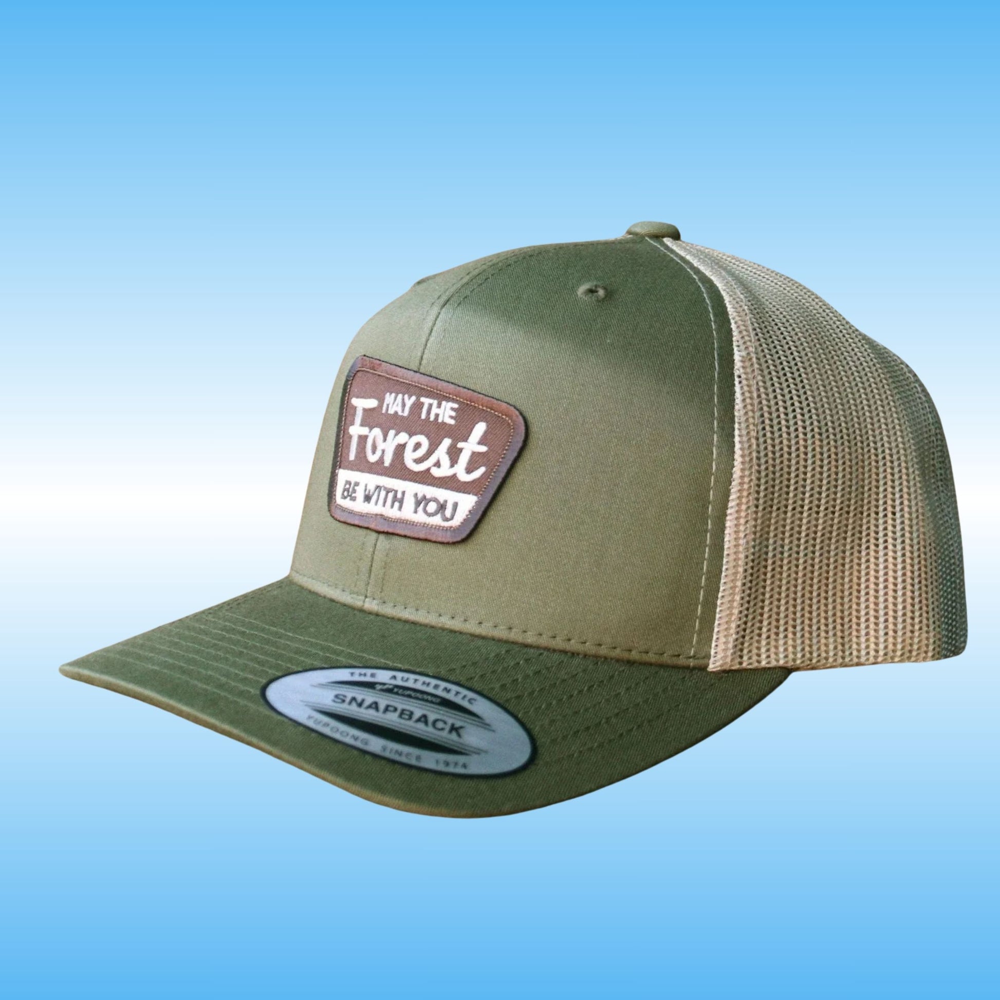 Olive green ball cap for hiking with a brown US parks patch "May the Forest be with you". at Paddle Frogs