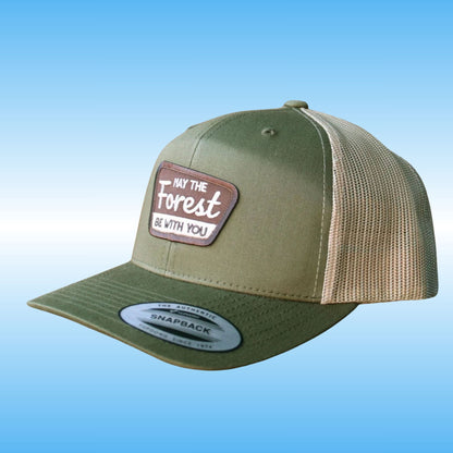 Olive green ball cap for hiking with a brown US parks patch "May the Forest be with you". at Paddle Frogs