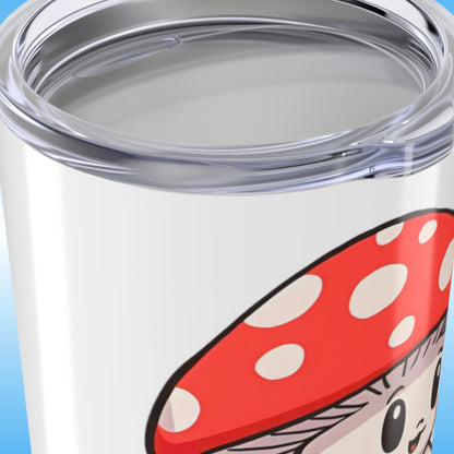 Mushroom Friend rides the Divine Escape paddle board | close up view of the lid on the Tumbler bottle | Close-up of a tumbler with a red and white polka dot design on a blue background
