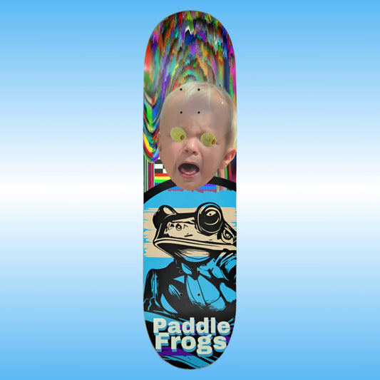 Olive Chaos - Paddle Frogs | Skateboard deck with colorful design and 'Paddle Frogs' branding on a blue background