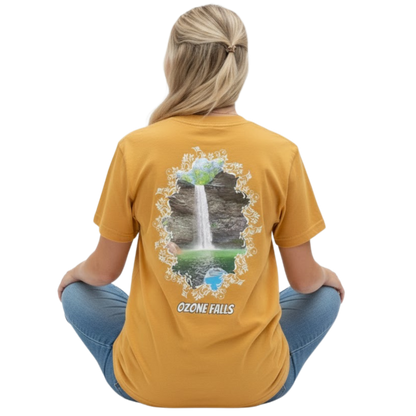 Ozone Falls | Plunge Waterfall Tee - Rockwood, TN faded mustard - Paddle Frogs™ Skate & Paddle lady model sitting crisscross applesauce on a transparent background