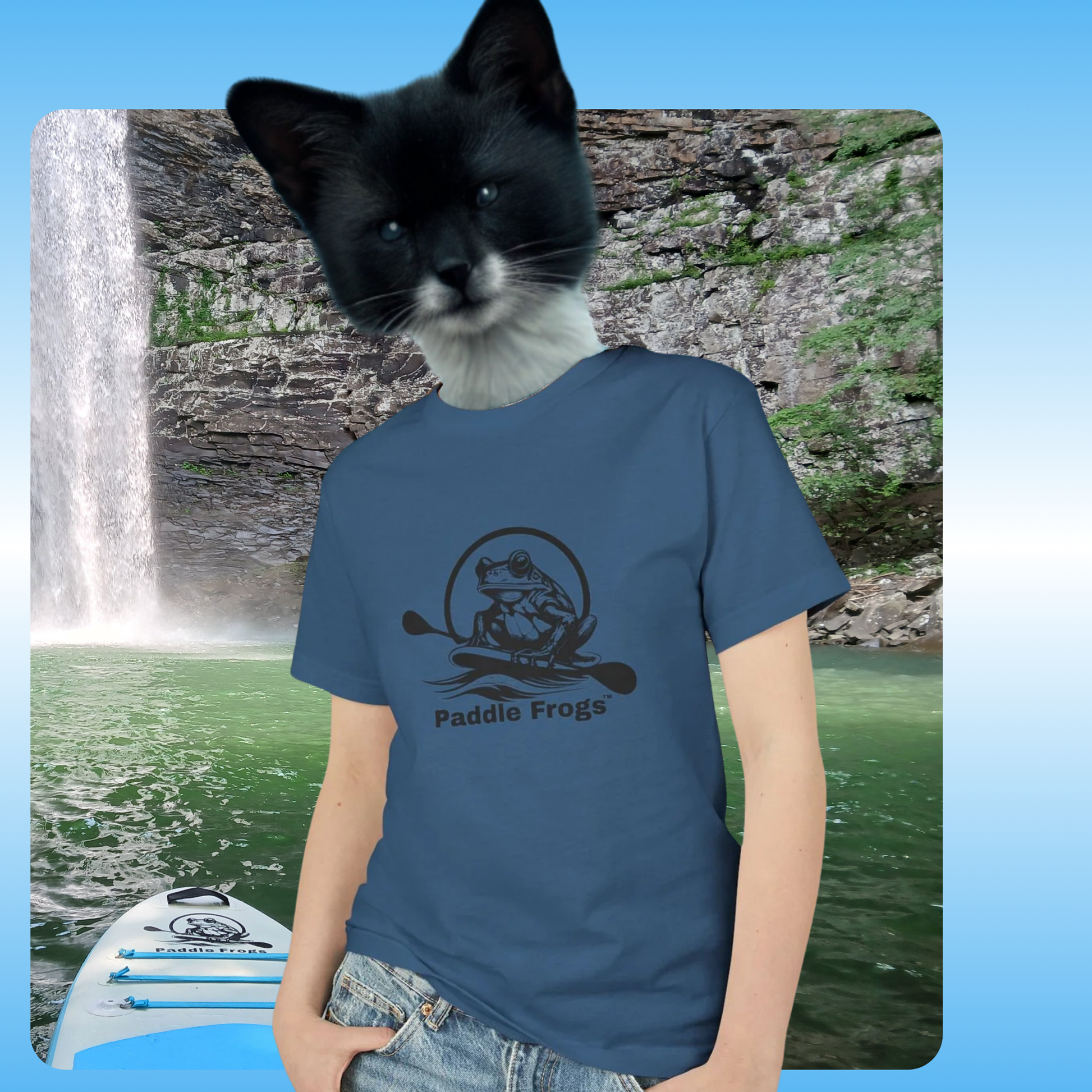 Ozone Falls Tee T-Shirt | Paddle Frogs | Rockwood Tennessee Tops | Fuzzy Fox | Person wearing a blue t-shirt with 'Paddie Frogs' logo in front of a waterfall background
