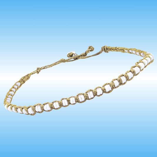 A handmade braided cord anklet with white shell beads, displayed against a blue gradient background.