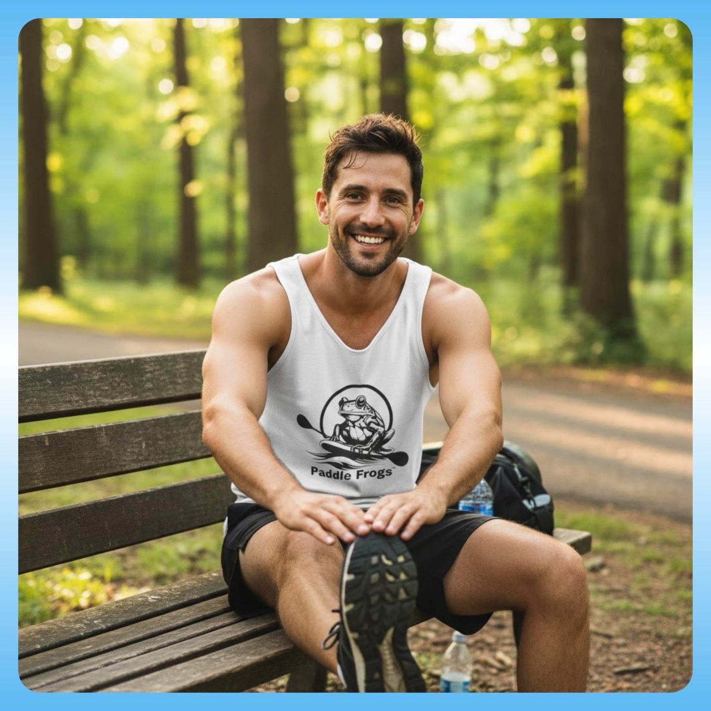 Paddle Frogs™ Men’s Tank Top stretch before running or exercise is important - Man sitting on a bench in a park wearing a tank top with a Paddle Frogs logo.