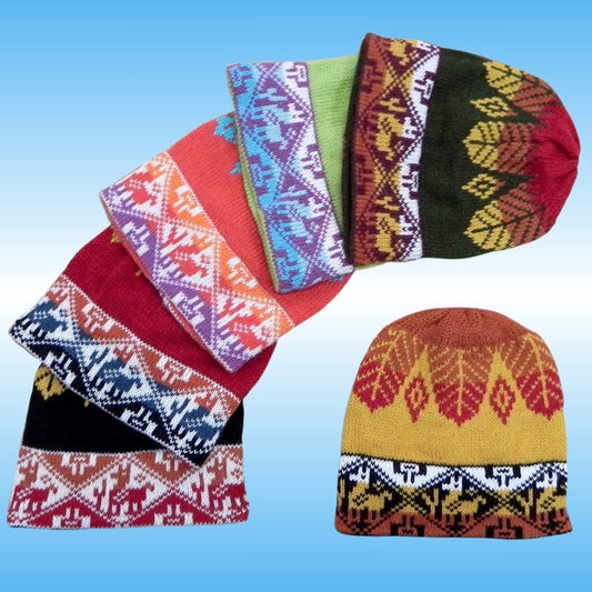 Six knitted beanie hats are arranged on a light blue gradient background, each showing different colorways and traditional geometric patterns. The hats feature a variety of colors including red, orange, purple, green, yellow, black, and white in geometric and animal motifs.