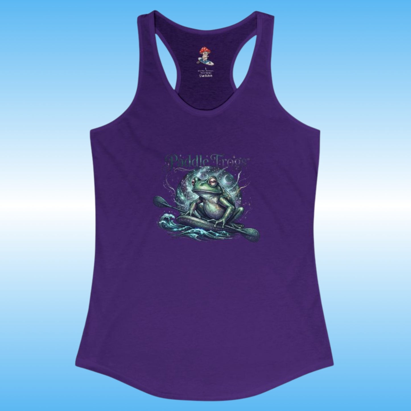 A purple racerback tank top featuring a graphic of a green frog meditating on water with the text 'Paddle Frogs'  printed on the front, set against a light blue gradient background.