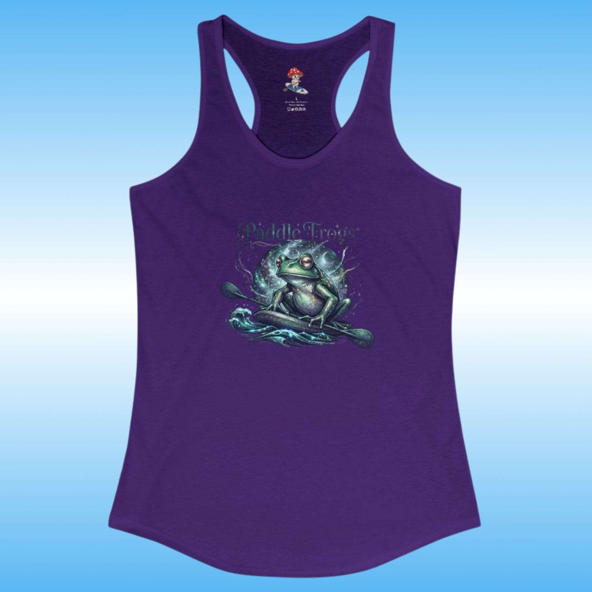 A purple racerback tank top featuring a graphic of a green frog meditating on water with the text 'Paddle Frogs'  printed on the front, set against a light blue gradient background.