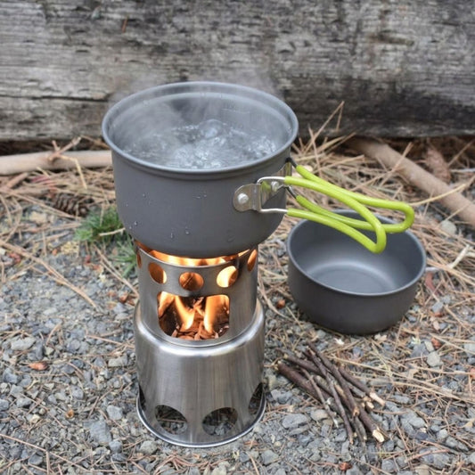 Bio Stove Cooking Kit includes two pots and a multi too. Here it is boiling water from just a few sticks.