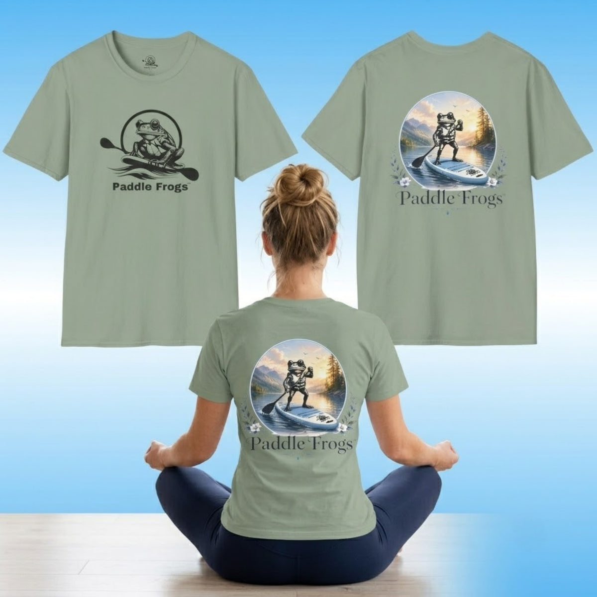 A sage green short-sleeve t-shirt with a black 'Paddle Frogs' frog graphic on the front and a large multicolor back graphic, shown on a model sitting cross-legged and as front/back views against a blue gradient background.