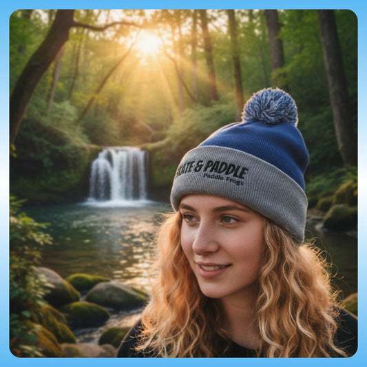 Paddle Frogs Skate & Paddle - The Summit & Surf Beanie: A Paddle Frogs Anthem lady in front of a forest waterfall