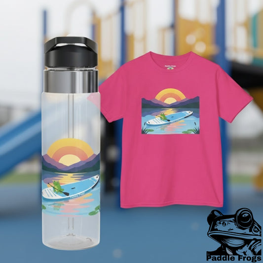 Clear water bottle and pink t-shirt with sunset paddle board design on a blurred background