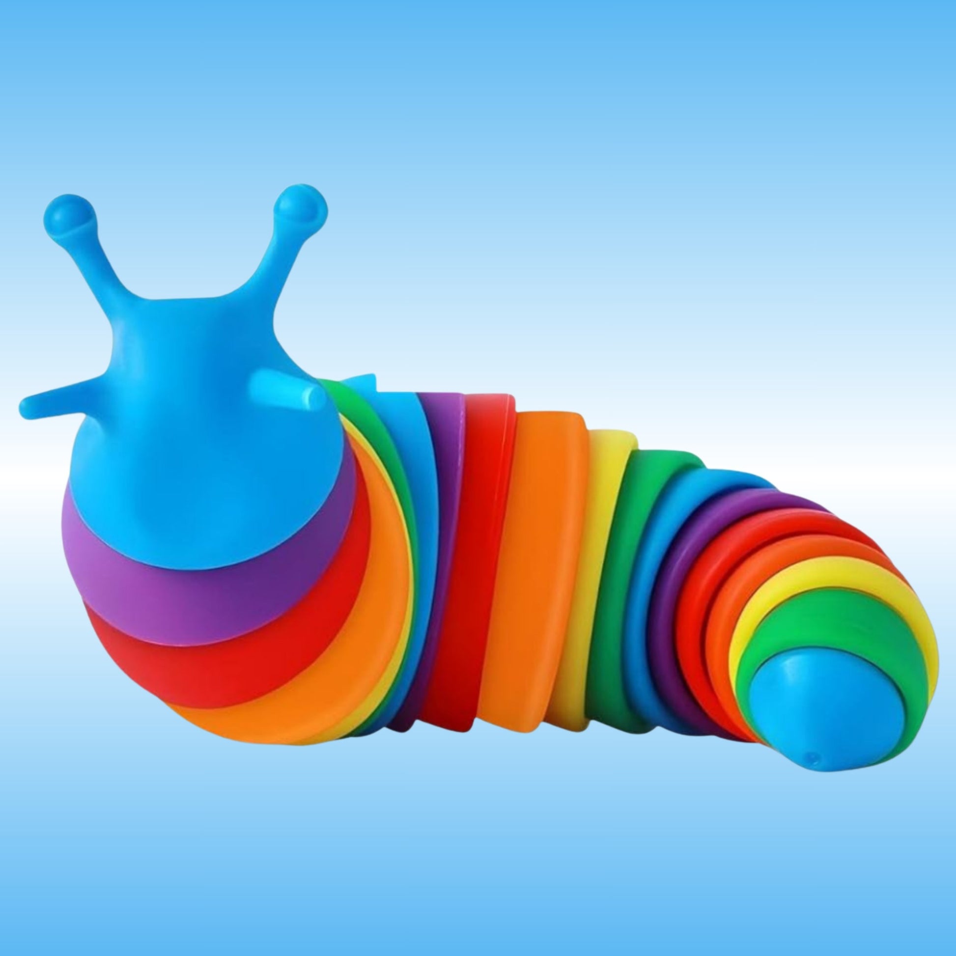 A colorful, fidget sensory toy, segmented slug toy made of smooth, rounded plastic rings in a rainbow of colors, with a bright blue head and antennae, set against a light blue gradient background.