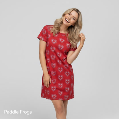 Red Heart Love Tee Dress Paddle Frogs model, showcasing a relaxed, happy, and vibrant demeanor in the dress.