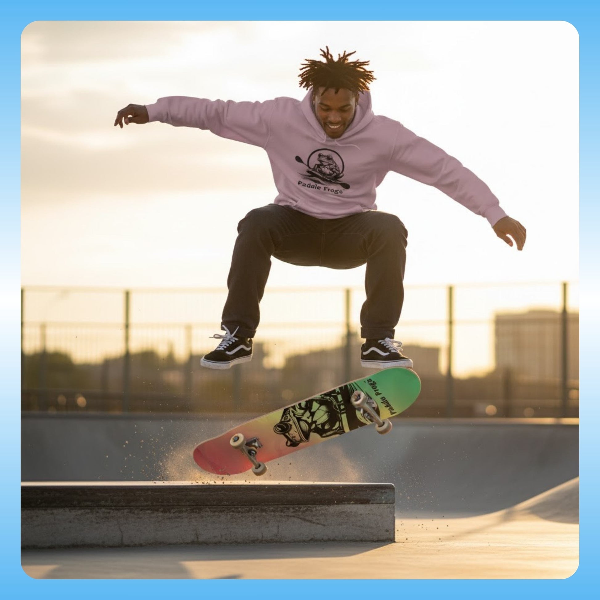 Person skateboarding at a park with a cityscape in the background Reggae Style | 8.75 | Paddle Frogs Skate Shop