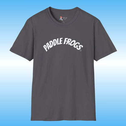 A dark gray 100% cotton, soft crewneck t-shirt featuring the words 'PADDLE FROGS' printed in white arched text across the chest, displayed against a blue gradient background.