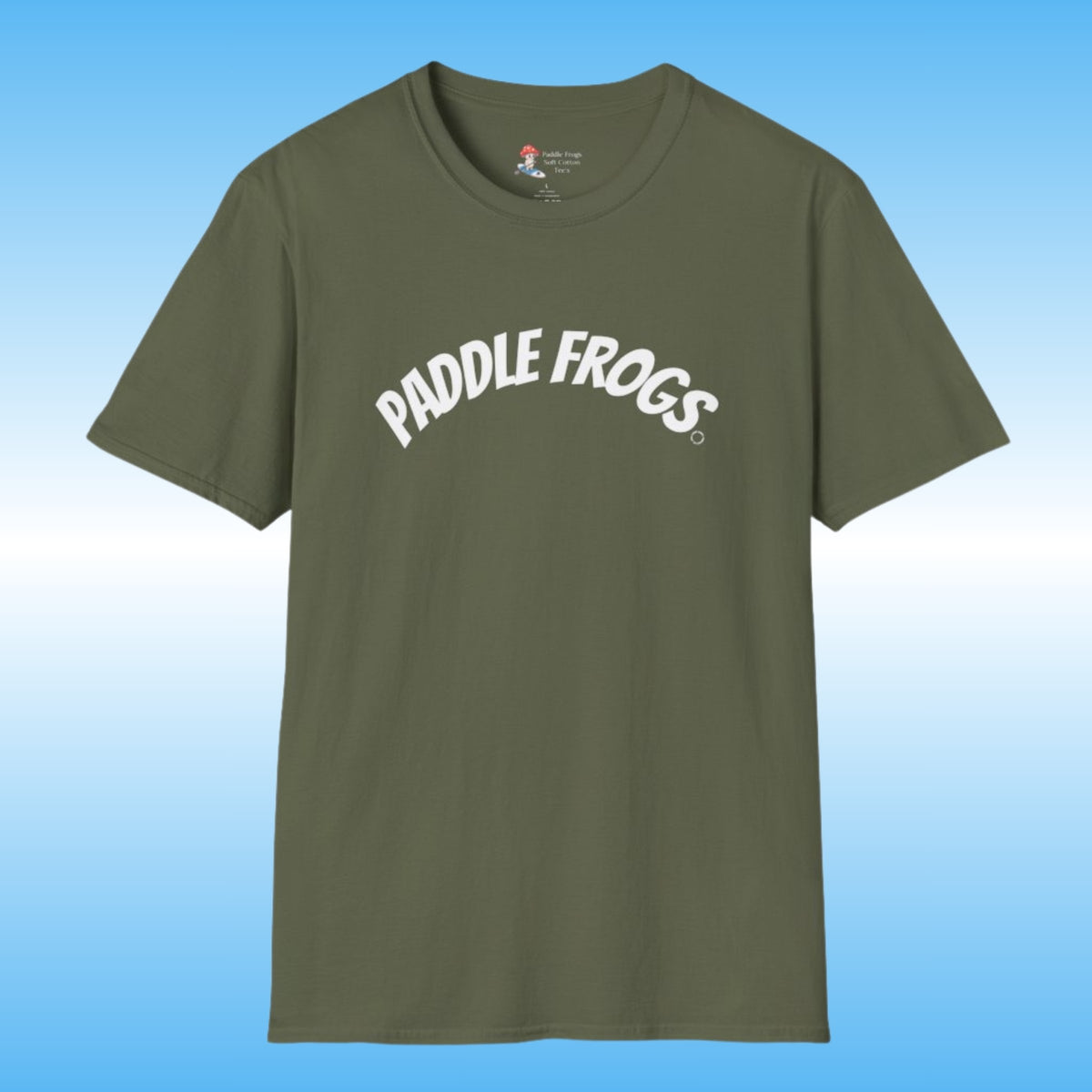 An olive green short-sleeve soft 100% cotton t-shirt with 'PADDLE FROGS' printed in white arched text across the chest, displayed against a blue gradient background.