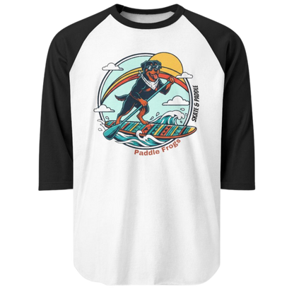Baseball t-shirt with a colorful graphic of a rottweiler dog paddleboarding on a wave, on a transparent background.