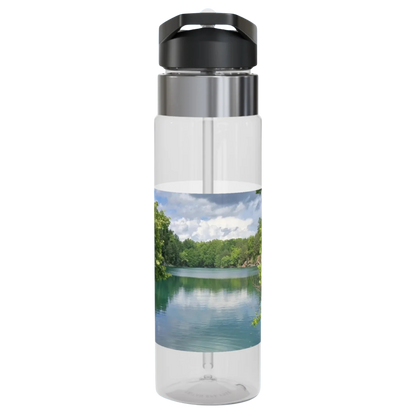 Secret City Quarry Clear water bottle with a scenic design of a lake and trees on a white background