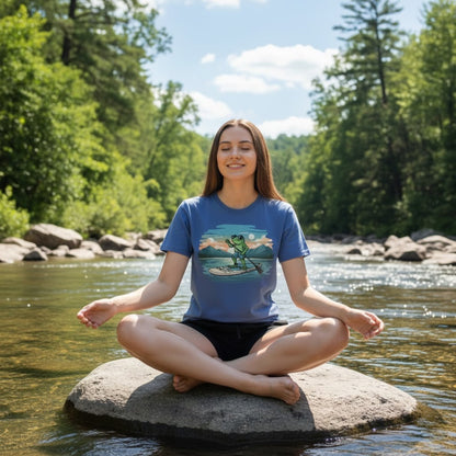 Lady walking in the river wearing the Iris Blue Lake Day Paddleboarding Frog tee by Paddle Frogs™