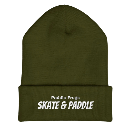 Green beanie with 'Paddle Frogs Skate & Paddle' text on a white background