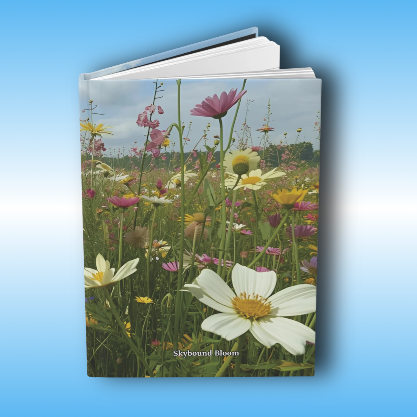 Skybound Bloom - Paddle Frogs Journal - Hard Cover | Poetry, Art, Nature Inspired Hardcover Notebook for Writers, Inspirational Diary, Wildflowers - Open Front Cover image | Book cover with a field of flowers and 'Skybound Bloom' text on a blue gradient background