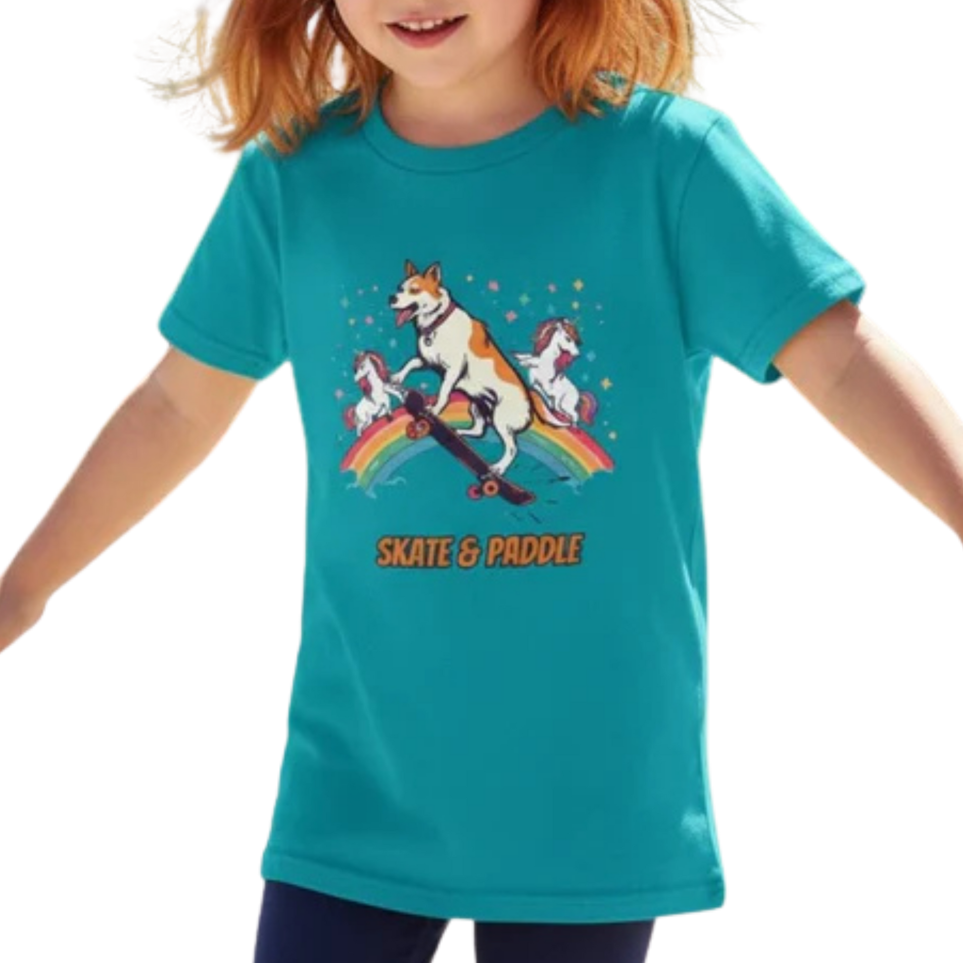 Child wearing a teal t-shirt with a graphic design of a dog and unicorn on a rainbow, with 'Skate & Paddle' text on a transparent background