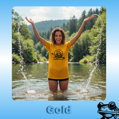 The Original Paddle Boarding T-Shirt | Paddle Frogs™ Gold color Tee | Woman in a yellow shirt standing in water with arms raised, surrounded by nature.