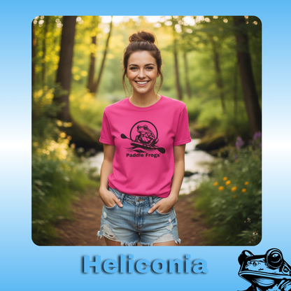 The Original Paddle Boarding T-Shirt | Paddle Frogs™ Heliconia (Pink) Tee | Woman wearing a pink t-shirt with 'Paddle Frogs' design in a forest setting