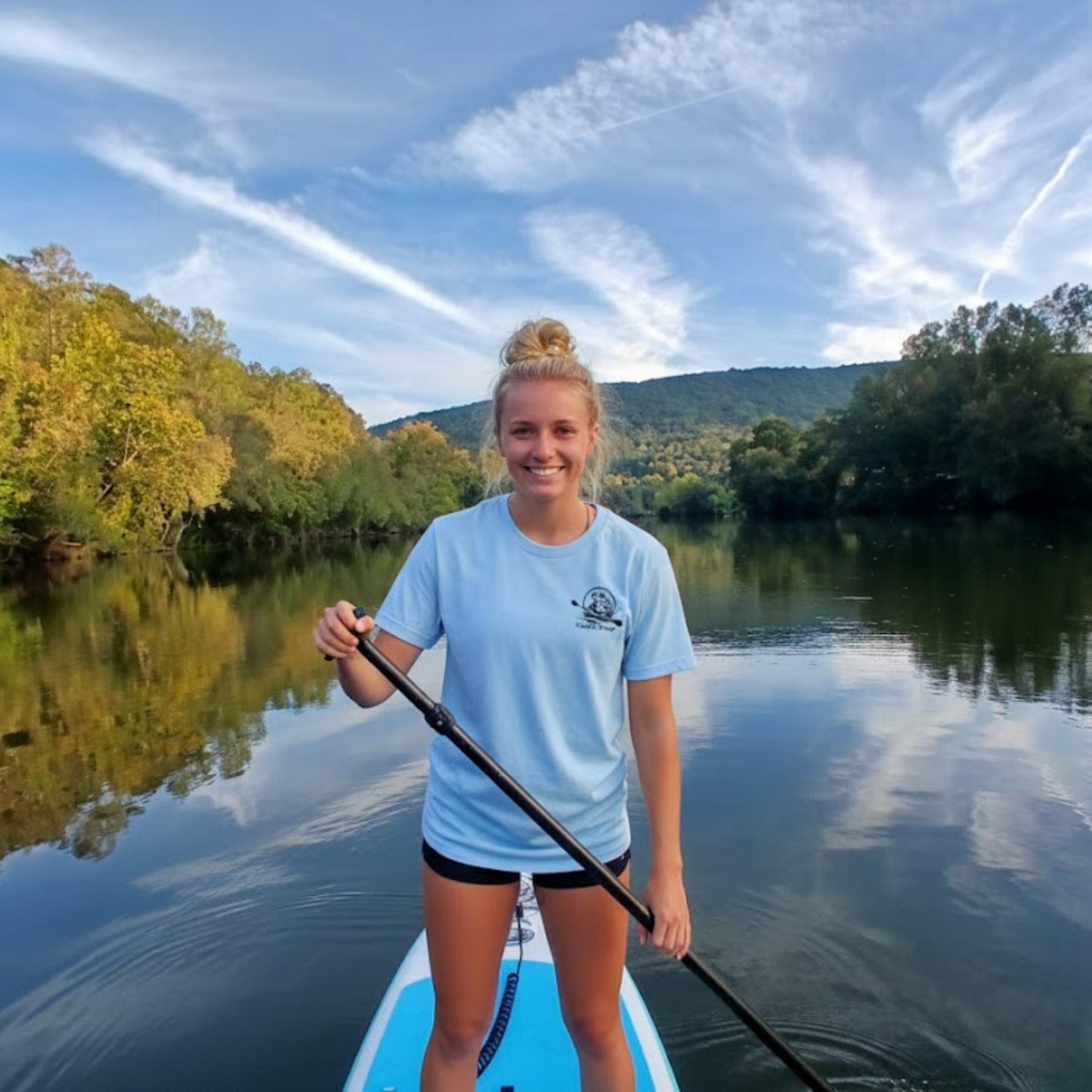 The River's Companion Tee: A Paddle Frog's Ode to the Current - Divine Escape at Emory River TN light blue