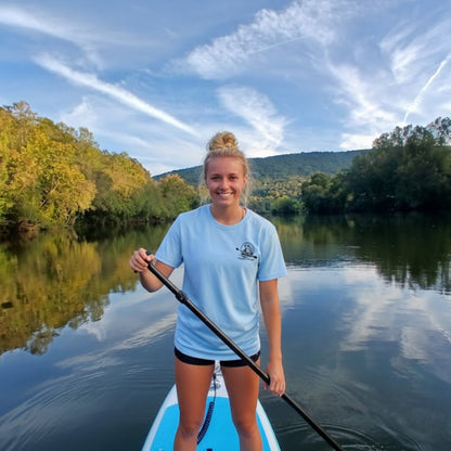 The River's Companion Tee: A Paddle Frog's Ode to the Current - Divine Escape at Emory River TN light blue