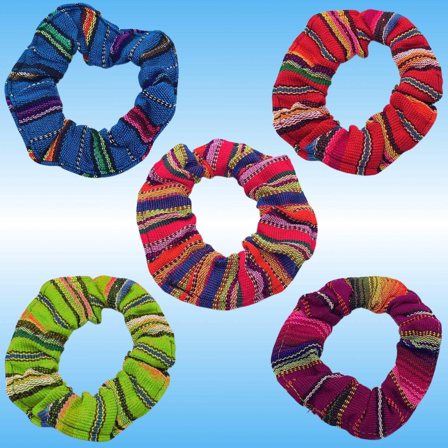 Five knitted fabric hair scrunchies in various vibrant multicolor striped patterns, arranged on a light blue gradient background.