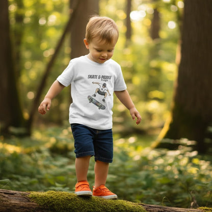 Toddler Skateboard Tee Germ "Skate & Paddle Frogs™ White in the woods with a boy walking on a log