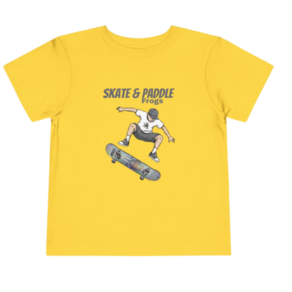 Toddler Skateboard Tee — Germ "Skate & Paddle Frogs™ Yellow on a transparent background