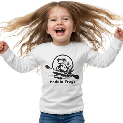 Child wearing a white long-sleeve shirt with 'Paddle Frogs' logo on a transparent background