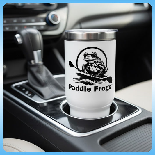 White tumbler with 'Paddle Frogs' design in a car cup holder