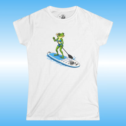 A white woman's tee with a lady frog stand up paddle boarding graphic. By Paddle Frogs outdoor gear