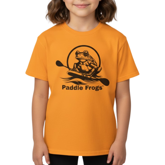 Child wearing an orange t-shirt with a 'Paddle Frogs' logo on a white background