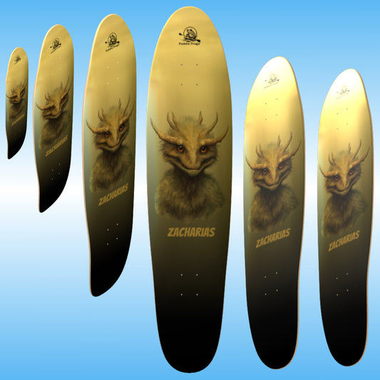 Zacharias - Paddle Frogs  | Skateboard decks with a creature design and 'Zacharias' branding on a blue background