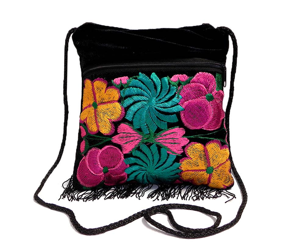 Black purse bag with colorful floral embroidery on a white background