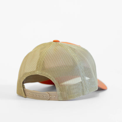 Beige and orange cap with mesh back on a white background