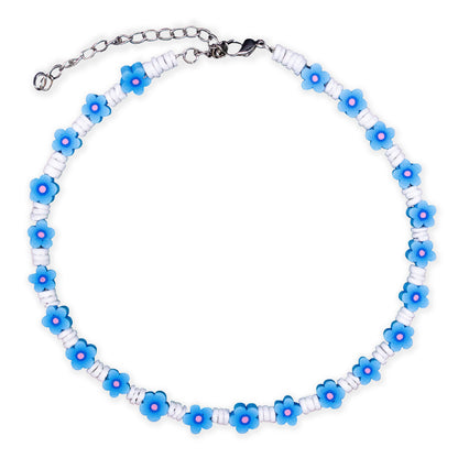 A beaded necklace featuring light blue flower beads with pink centers and white cylindrical beads, connected by a silver-toned chain with a lobster clasp.