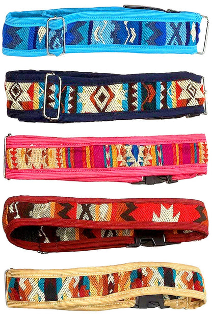 Set of colorful patterned dog collars on a white background